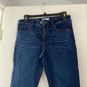 Loft distresses mid rise jean